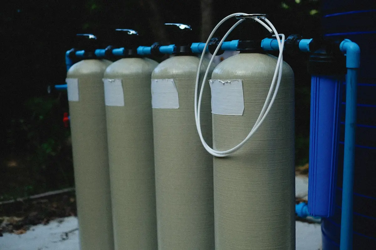 Media tanks and a filter housing in a water treatment system, water softener installation in west Broward